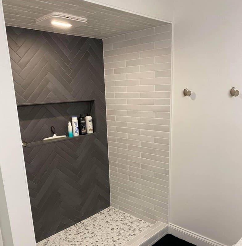 Double vanity with quartz countertop and faucets